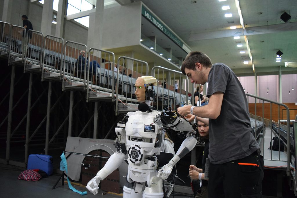 Robot fixing a road, showing robotic road maintenance tech.