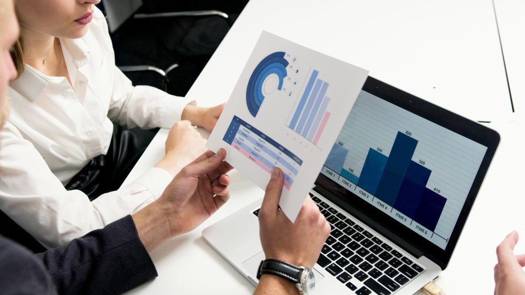 Financial dashboard with graphs showing AI-powered business management.