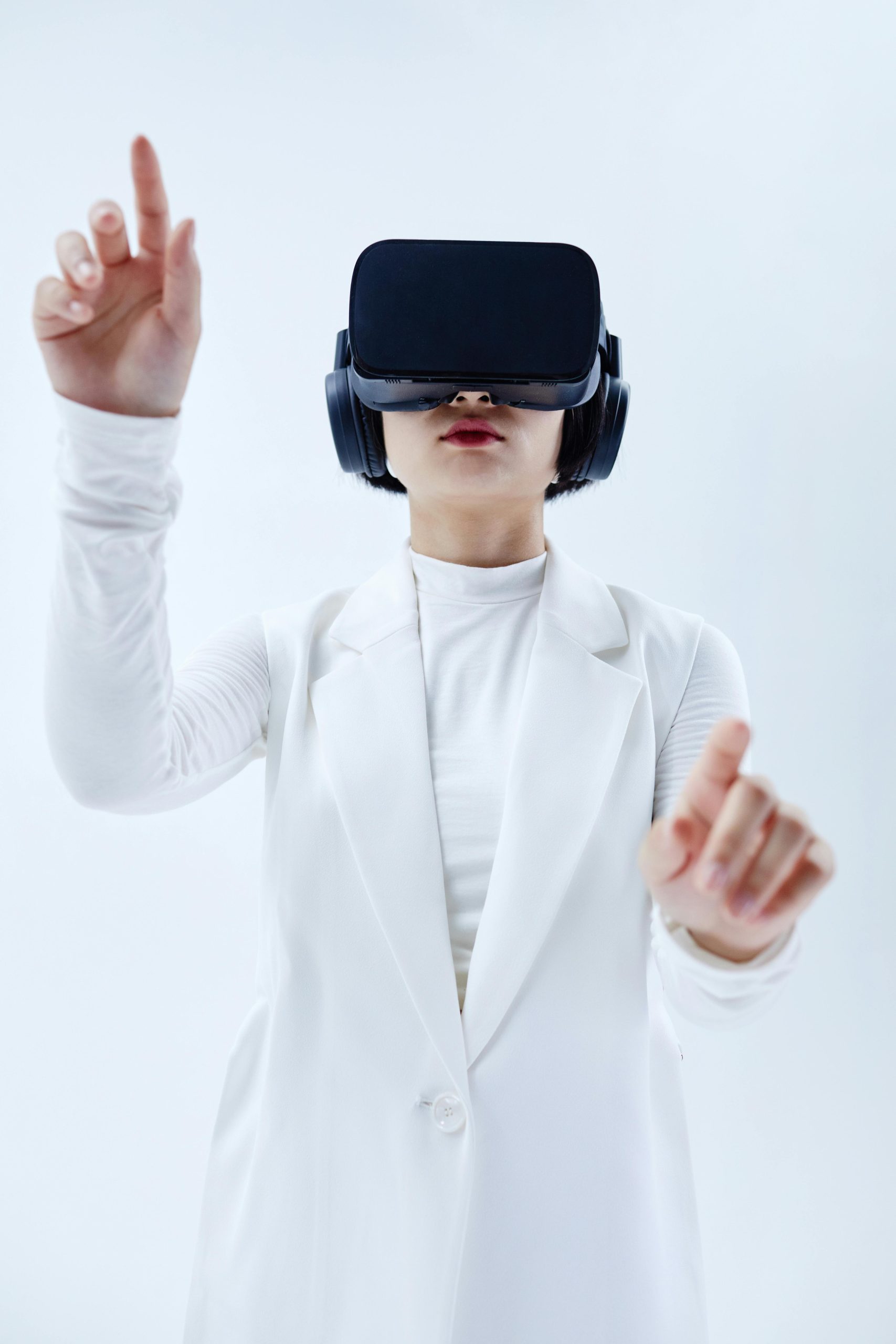 A person wearing a virtual reality headset is experiencing a virtual world.
